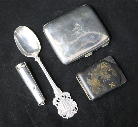 A Japanese match case, silver cigarette case, spoon, amber & gold mounted cigarette holder in silver case